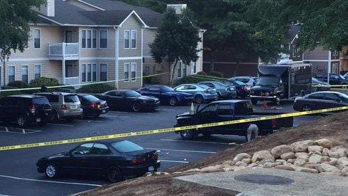 A Marietta police officer was shot outside The Gallery Apartments Sunday morning. (Credit: Channel 2 Action News)