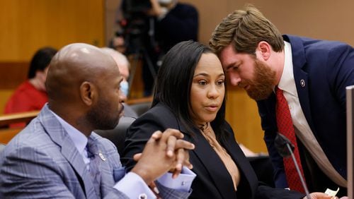 Fulton County D.A. Fani Willis (center) confers with colleagues Nathan Wade (left) and Donald Wakeford (right) during a Jan. 24, 2023, hearing before Fulton Superior Court Judge Robert McBurney. (Miguel Martinez/Atlanta Journal-Constitution/TNS)