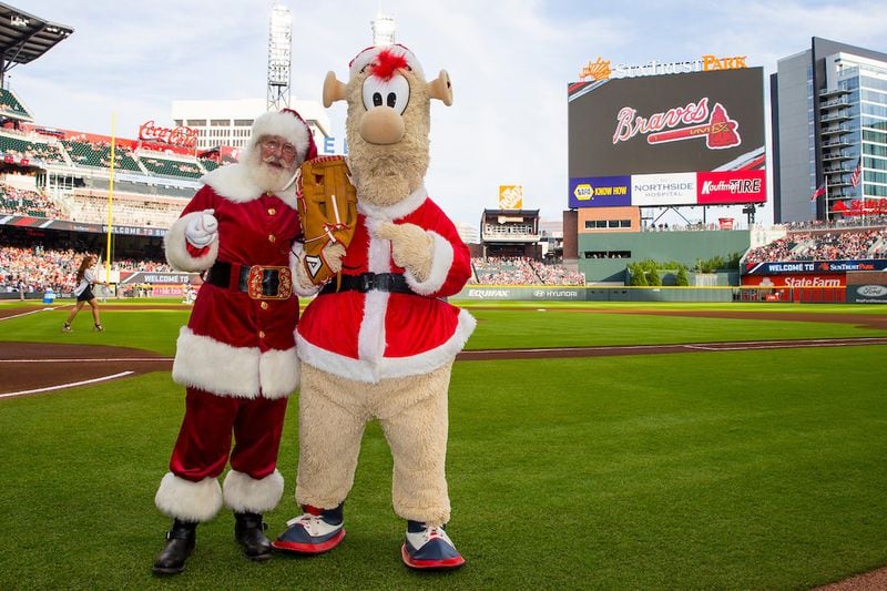 Santa poses with Atlanta Braves mascot Blooper at SunTrust Park. Contributed by Atlanta Braves