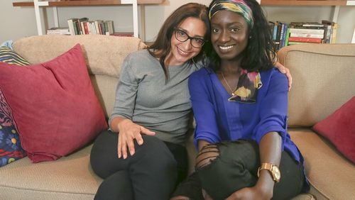 Melissa DePino (left) and Michelle Saahene have created From Privilege to Progress, a campaign to get white people to share the experiences of people of color on their social networks. STEVEN M. FALK / PHILADELPHIA INQUIRER / TNS