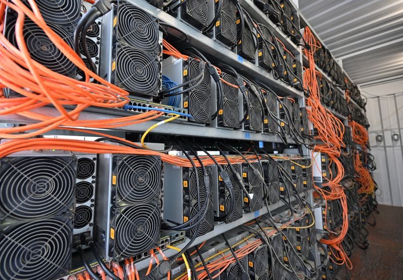 Thousands of computers are packed into a bitcoin mining facility at Cleanspark in College Park.  Georgia has become a destination for such facilities.  (Hyosub Shin / Hyosub.Shin@ajc.com)