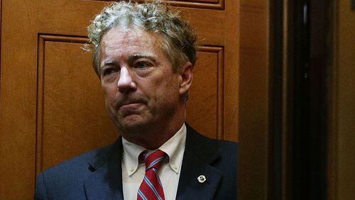 U.S. Sen. Rand Paul (R-KY) takes the elevator as he arrives at the Capitol for a vote November 13, 2017 in Washington, DC. Sen. Paul returned to Capitol Hill after he was attacked by his neighbor Rene Boucher and broke six of his ribs while mowing the lawn at his Kentucky home on November 3.  (Photo by Alex Wong/Getty Images)