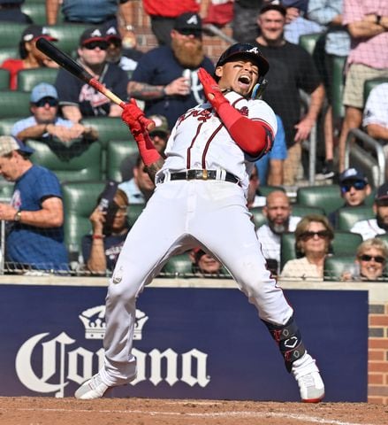 Atlanta Braves' Orlando Arcia reacts after nearly being hit by a pitch during the fifth inning of game one of the baseball playoff series between the Braves and the Phillies at Truist Park in Atlanta on Tuesday, October 11, 2022. (Hyosub Shin / Hyosub.Shin@ajc.com)