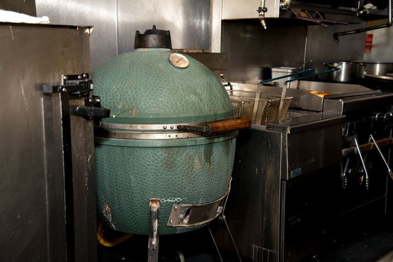The well-used XL Big Green Egg in the kitchen at Muss & Turner’s. MIA YAKEL