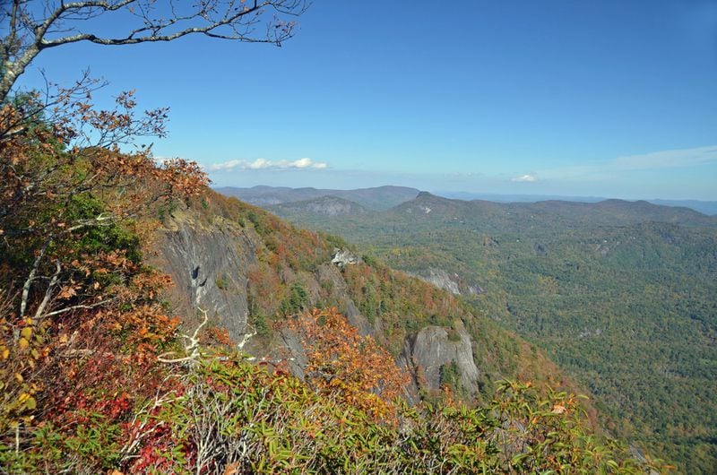 Georgians looking for fall colors can make a little trip out of it. In Jackson County, N.C., Whiteside Mountain (shown in a file photo) is known for offering glorious colors. It is peaking now. CONTRIBUTED BY MARY ANNE BAKER