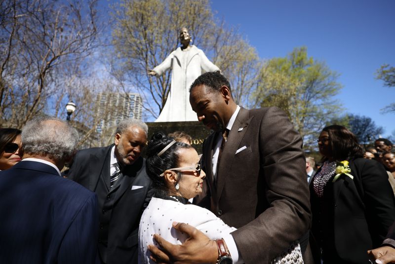 Xermona Clayton is congratulated by Atlanta Mayor Andre Dickens moments after the unveiling of her statue on Wednesday, March 8, 2023. 
Miguel Martinez /miguel.martinezjimenez@ajc.com
