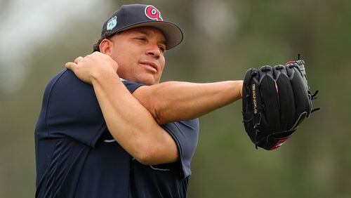 Bartolo Colon loosens before a recent spring-training workout. He’ll start the Braves’ Grapefruit League opener Saturday against Toronto. (Curtis Compton/ccompton@ajc.com)