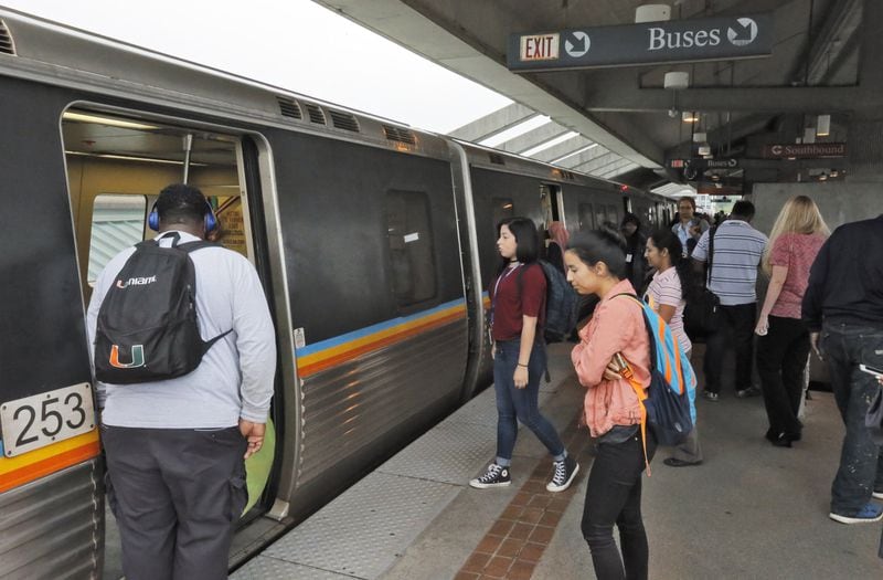 April 19, 2017 - Atlanta - MARTA passengers board a train at the Doraville station. MARTAs Twitter account reported the parking lots were full at 8:11 AM. The collapse of a portion of I-85 some three weeks ago has been a headache for Atlanta drivers, but is proving to be a golden opportunity for MARTA. Long neglected in a car-crazy region, MARTA is getting a second look from commuters desperate to avoid gridlock. Ridership is up. MARTA parking lots are packed. BOB ANDRES /BANDRES@AJC.COM