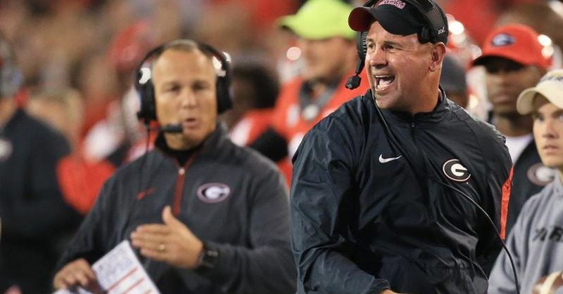 Georgia coach Mark Richt and defensive coordinator Jeremy Pruitt react on the sidelines as Georgia draws a penalty against Missouri on Saturday, Oct. 17, 2015, in Athens. (Curtis Compton/ccompton@ajc.com)