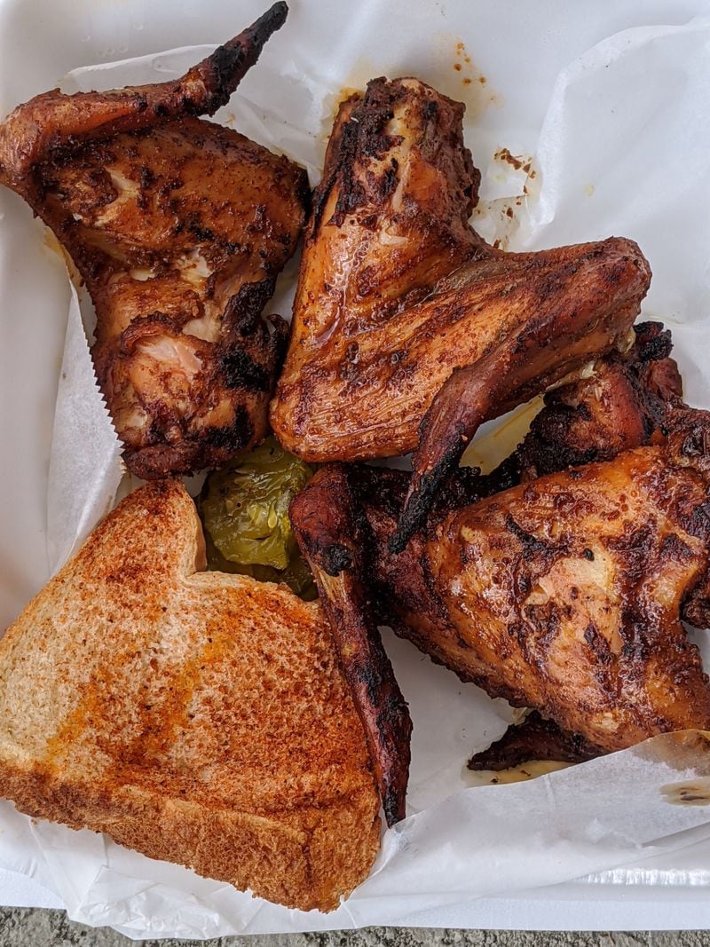 The whole wings from Lake & Oak BBQ are deeply smoky and juicy. CONTRIBUTED BY PAULA PONTES