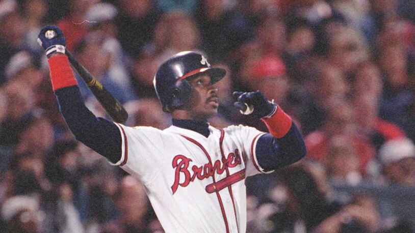 Fred McGriff watches his home run leave the park. (AJC photo/David Tulis) 10/95