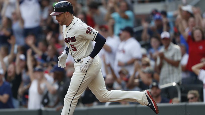 Atlanta Braves' Freddie Freeman rounds the bases after hitting a two-run home run in the first inning Sunday, Sept. 1, 2019, against the Chicago White Sox at SunTrust Park in Atlanta.