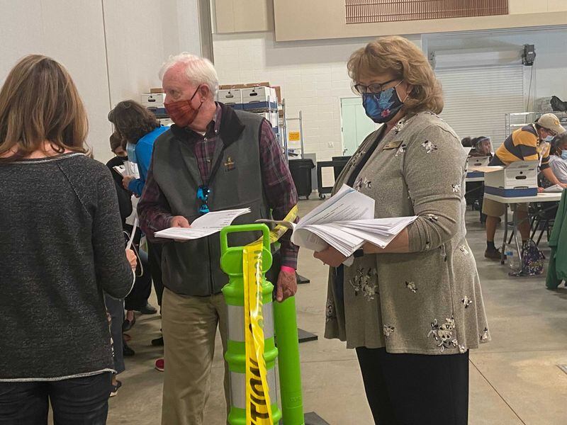 Cobb elections director Janine Eveler, right, speaks with observers in Marietta during the recount on Nov. 14, 2020. Credit: Shaddi Abusaid