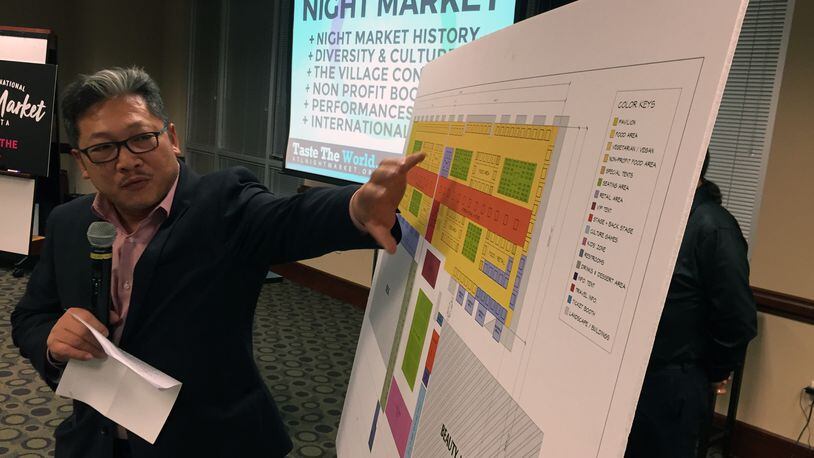 David Lee points out the proposed lay out for the Atlanta International Night Market at Gwinnett Place Mall in Duluth at a Gwinnett Chamber of Commerce presentation in January, 2017.
