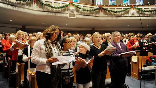 Each holiday season singers bring their own scores and join in for a "Messiah" sing-along at area churches. This one was at Roswell United Methodist Church a few years ago.