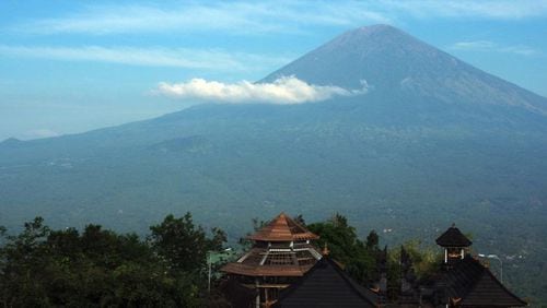 BALI, INDONESIA - A general view of Mount Agung is seen from Lempuyang Temple in Lempuyang village of Karangasem Regency, Bali, Indonesia on September 28, 2017. After Mount Agung's alert phase reached critical, the tourist destination and the local Hindus praying place Lempuyang Temple is now deserted from tourists. (Photo by Mahendra Moonstar/Anadolu Agency/Getty Images)