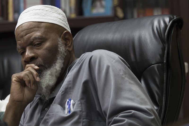 Imam Siraj Wahhaj speaks to reporters, Thursday, Aug. 9, 2018, in New York. Wahhaj, the grandfather of a missing Georgia boy, says the remains of the child were found buried at a desert compound in New Mexico. Abdul-ghani Wahhaj was found Monday, on what would have been his fourth birthday, after he went missing in December in Jonesboro, Ga. near Atlanta. (AP Photo/Mary Altaffer)