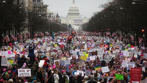 WASHINGTON, DC - JANUARY 21: Protesters walk up Pennsylvania Avenue during the Women's March on Washington, with the U.S. Capitol in the background, on January 21, 2017 in Washington, DC. The Indianapolis Star reported that Sen. Jack E. Sandlin shared a Facebook post calling particpants "fat women." (Photo by Mario Tama/Getty Images)