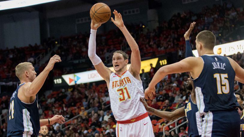 Atlanta Hawks forward Mike Muscala (31) passes during an NBA game against the Denver Nuggets at Philips Arena, Friday, Oct. 27, 2017, in Atlanta.  BRANDEN CAMP/SPECIAL