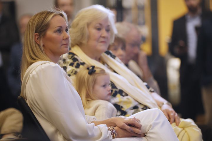 Georgia Tech's head football coach Brent Key's wife, Danielle Key, and her family listen to him during his introductory news conference Monday,  Dec. 5, 2022.
 Miguel Martinez / miguel.martinezjimenez@ajc.com