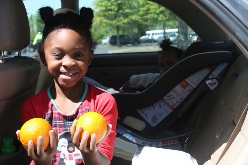 A snapshot of the young faces looking at nutritious food going home with them at a mobile pantry served by Mid-South Food Bank.