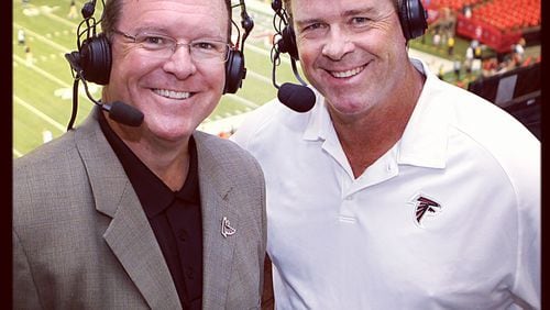 Wes Durham and Dave Archer in the Georgia Dome radio broadcast booth. (Courtesy Jimmy Cribb)