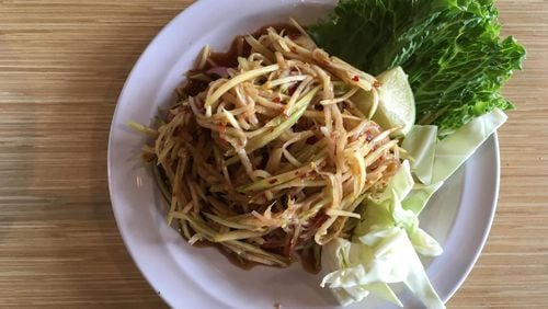 Green papaya salad is a funky, spicy pleasure at Snackboxe Bistro. CONTRIBUTED BY WYATT WILLIAMS
