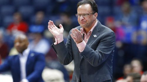 Georgia head coach Tom Crean watches the action in the first half of an NCAA college basketball game against Mississippi in the Southeastern Conference Tournament Wednesday, March 11, 2020, in Nashville, Tenn. (AP Photo/Mark Humphrey)