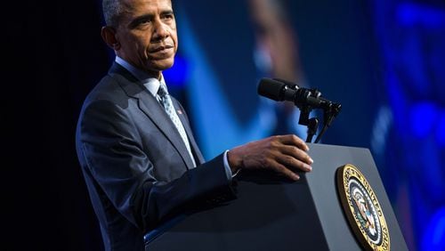 President Barack Obama commuted 214 sentences for federal inmates on Wednesday.