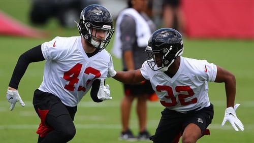 Falcons safety Parker Baldwin (left) works against cornerback Rashard Causey (right) during rookie minicamp on Friday, May 10, 2019, in Flowery Branch. Curtis Compton/ccompton@ajc.com