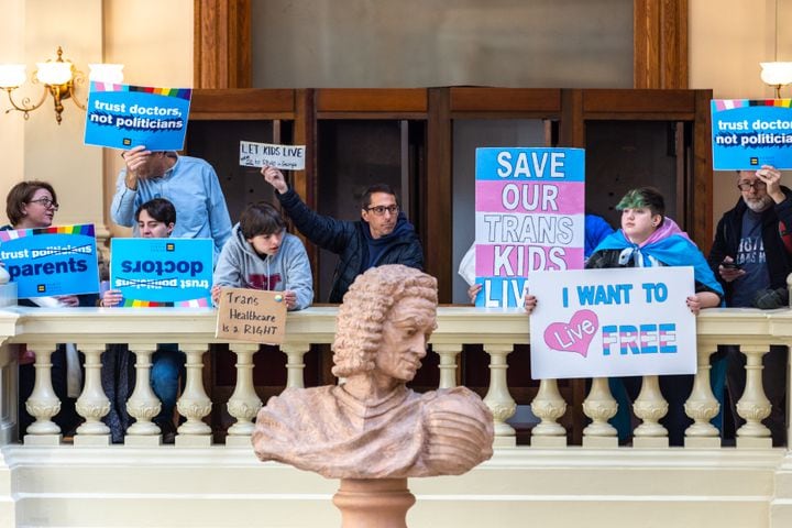 Opponents of SB 140, a bill that would prevent medical professionals from giving transgender children certain hormones or surgical treatment, gather in the Capitol in Atlanta on Monday, March 20, 2023. (Arvin Temkar / arvin.temkar@ajc.com)
