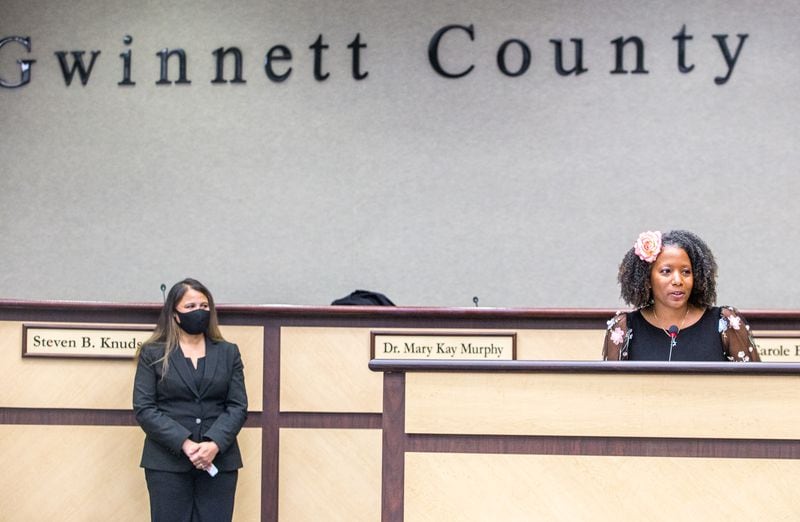 Gwinnett County School Board swears in two new members Karen Watkins, left, and Dr. Tarece Johnson, right, on Dec 17, 2020. Both of the new board members voted to terminate Superintendent J. Alvin Wilbanks' contract early. (Jenni Girtman for The Atlanta Journal-Constitution)