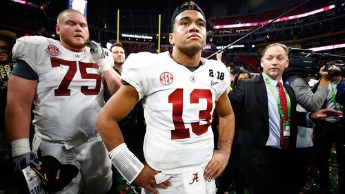 ATLANTA, GA - JANUARY 08:  Tua Tagovailoa #13 of the Alabama Crimson Tide stands on the field after beating the Georgia Bulldogs in overtime to win the CFP National Championship presented by AT&T at Mercedes-Benz Stadium on January 8, 2018 in Atlanta, Georgia. The Alabama Crimson Tide won 26-23.  (Photo by Jamie Squire/Getty Images)