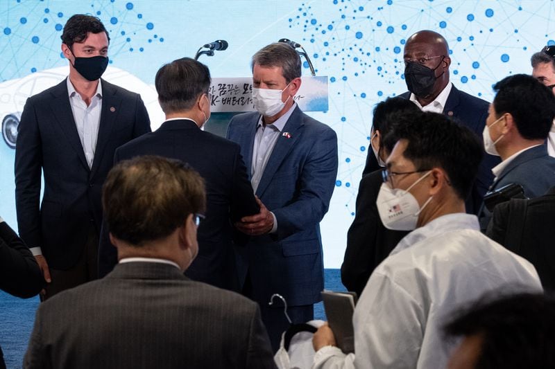 U.S. Sen. Jon Ossoff (from left), South Korean President Moon Jae-in, Gov. Brian Kemp and U.S. Sen. Raphael Warnock greet each other following a presentation at the new SK Battery America factory in Commerce on Saturday afternoon, May 22, 2021.  (Photo: Ben Gray for The Atlanta Journal-Constitution)