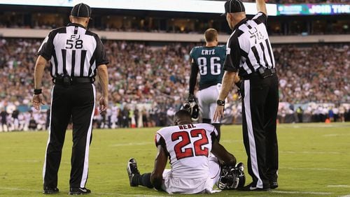 Keanu Neal of the Falcons sits on the ground after suffering an apparent injury during the first half against the Philadelphia Eagles at Lincoln Financial Field on September 6, 2018 in Philadelphia.  (Photo by Mitchell Leff/Getty Images)