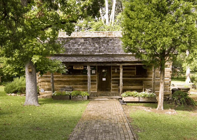 Uncle Remus Museum: This cabin in Eatonton is dedicated to the memory and work of town son, Joel Chandler Harris. Harris’s tales of Brer Rabbit originated in Africa. They were originally told on southern plantations by slaves. The museum is made of portions of at least two slave cabins. (Courtesy of the Uncle Remus Museum)