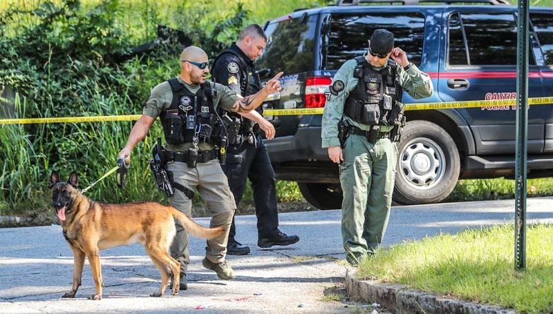 Atlanta police officers and a K-9 unit were investigating Thursday after a man was shot on Neal Street in a residential area of northwest Atlanta.