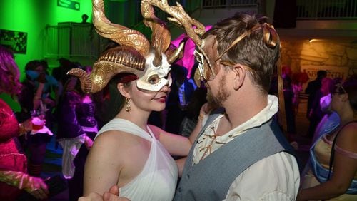 Guests dance at the first Labyrinth Masquerade Ball at the Center for Puppetry Arts in September 2016. The center will host its second Labyrinth ball Aug. 31. CONTRIBUTED BY CENTER FOR PUPPETRY ARTS