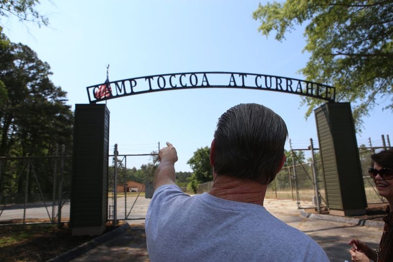 May 19, 2017, Toccoa, Georgia - Patrick Hall points to the sign and area of Camp Toccoa at Currahee in Toccoa, Georgia, on May 19, 2017. (HENRY TAYLOR / HENRY.TAYLOR@AJC.COM)