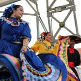 Dancers take the stage at the LatinxFest in Athens, Georgia on July 29, 2023.