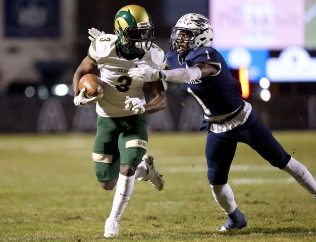 Dec. 18, 2020 - Norcross, Ga: Grayson wide receiver Jaden Smith (3) runs after a catch against Norcross Josh Graham (1) in the first half of the Class AAAAAAA semi-final game at Norcross high school Friday, December 18, 2020 in Suwanee, Ga.. JASON GETZ FOR THE ATLANTA JOURNAL-CONSTITUTION