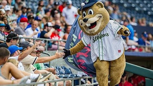 Chopper the Groundhog greets fans at a Gwinnett Stripers game. The team will offer a Ronald Acuna Jr. bobblehead giveaway this weekend.