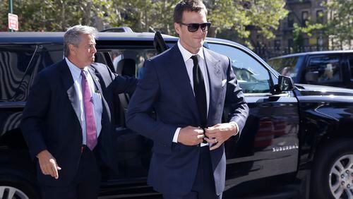 New England Patriots quarterback Tom Brady arrives at federal court, Wednesday in New York. Brady and NFL commissioner Roger Goodell explained to a judge why a controversy over underinflated footballs at last season's AFC conference championship game is spilling into a new season. (AP photo)