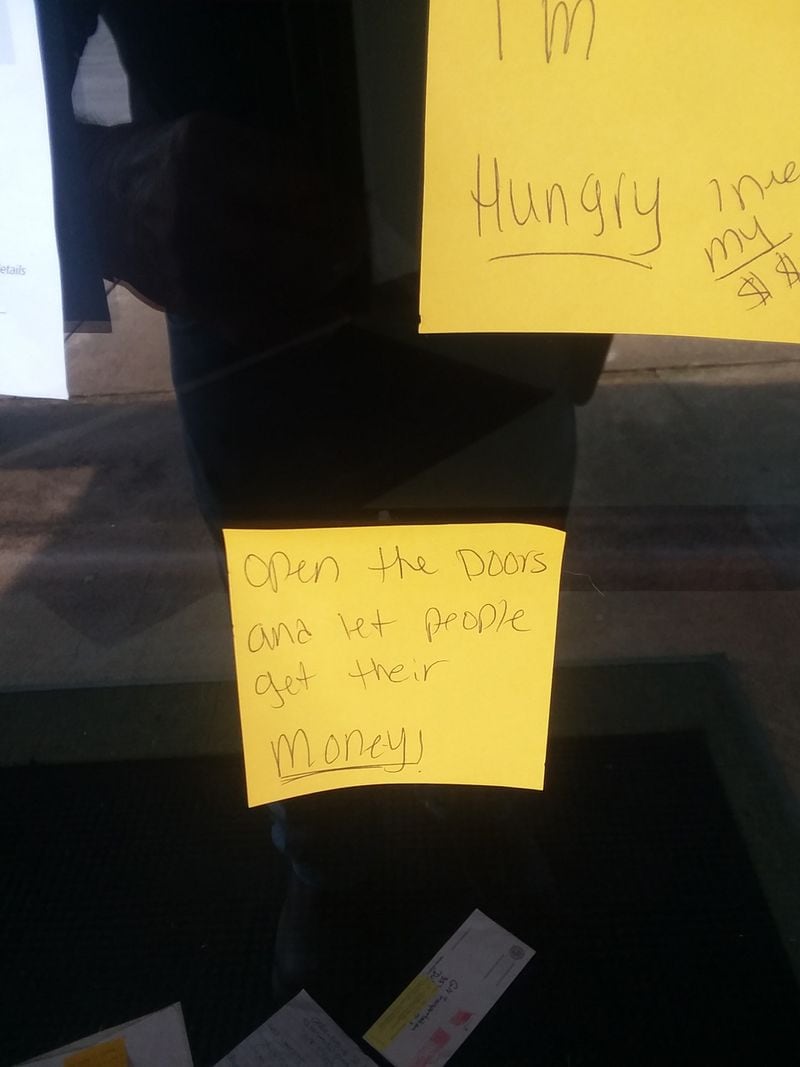 Bill O'Neal, a Meriwether County plant worker, snapped this photo of notes left on the door of the Georgia Department of Labor's office in Griffin. The labor department offices have been closed throughout the pandemic.