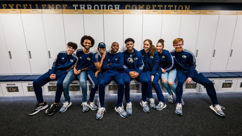 Members of Georgia Tech's track and field and cross country teams gather for a photo during the Jan. 18, 2022 unveiling of the Michael K. Anderson Building that will house locker rooms and other spaces dedicated to the teams. (Danny Karnik/Georgia Tech Athletics)