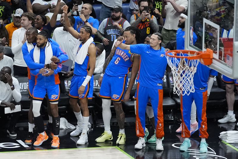 The Oklahoma City Thunder bench reacts late in the second half of Game 4 of an NBA basketball first-round playoff series against the New Orleans Pelicans in New Orleans, Monday, April 29, 2024. The Thunder won 97-89 to sweep the series and advance to the second round. (AP Photo/Gerald Herbert)