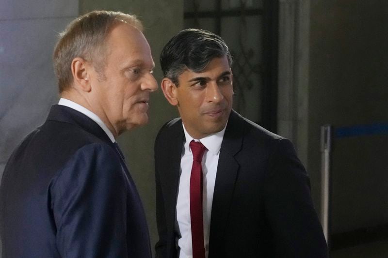 Polish Prime Minister Donald Tusk, left, and Britain's Prime Minister Rishi Sunak pose at the Prime Minister Office in Warsaw, Poland, Tuesday, April 23, 2024. Sunak will hold talks with Tusk and Stoltenberg that will focus on Ukraine and wider European security. (AP Photo/Czarek Sokolowski)