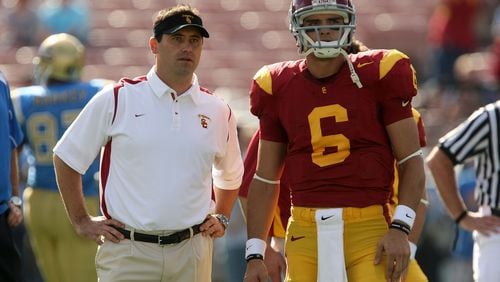 PASADENA, CA - DECEMBER 06: Offensive coordinator Steve Sarkisian and quarterback Mark Sanchez of the USC Trojans talk during warm ups before the game against the UCLA Bruins on December 6, 2008 at the Rose Bowl in Pasadena, California. (Photo by Stephen Dunn/Getty Images)
