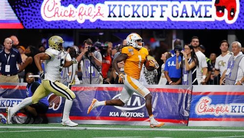 ATLANTA, GA - SEPTEMBER 04:  Marquez Callaway #1 of the Tennessee Volunteers rushes for a touchdown past A.J. Gray #5 of the Georgia Tech Yellow Jackets at Mercedes-Benz Stadium on September 4, 2017 in Atlanta, Georgia.  (Photo by Kevin C. Cox/Getty Images)