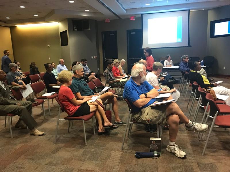 About two dozen people attended the first of three Atlanta school board property tax hearings  on Monday, July 16. Residents who spoke asked the school board to lower the property tax millage by more than the proposed one-mill reduction. VANESSA McCRAY/AJC